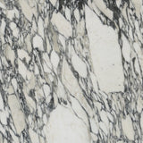 Marble slab with a gray and white pattern on display