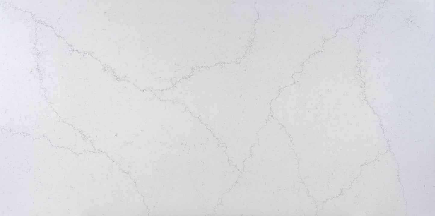 White marble tile with subtle gray veining on a white background